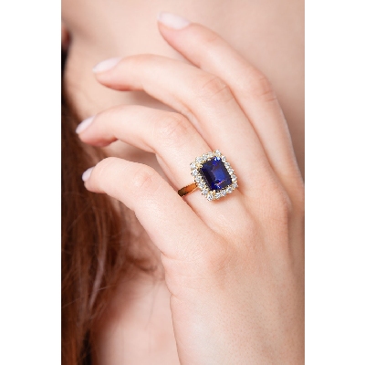 Gelbgold 750 Ring mit Saphir blau und Diamanten