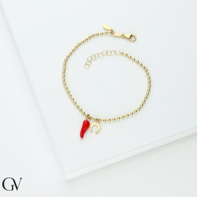 Glücksarmband mit Hornanhänger und Hufeisen Gelbgold