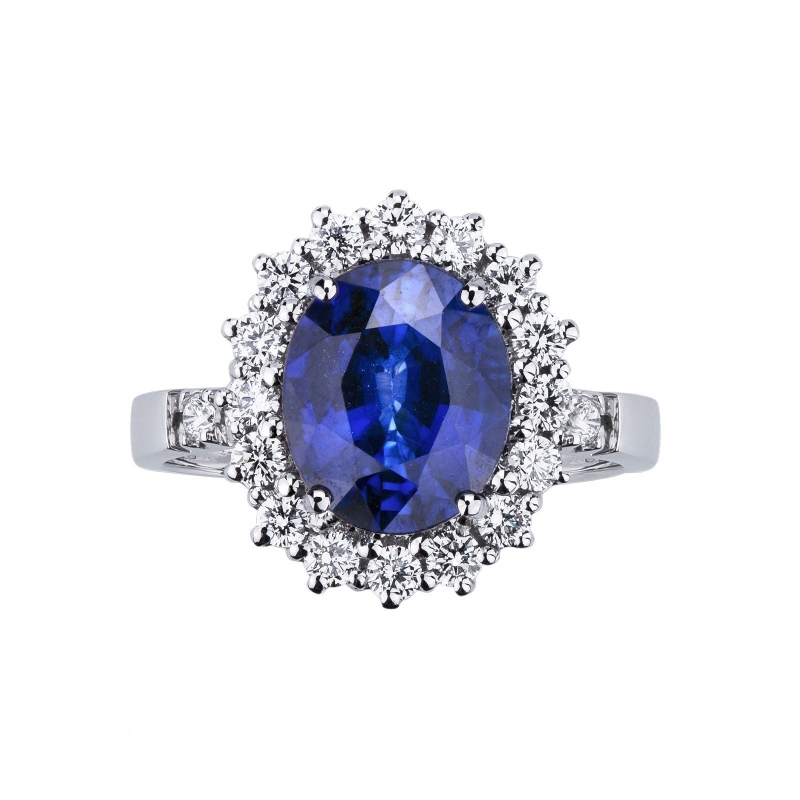 18K Weißgold Halo Ring mit einem blauen Saphir und Diamanten