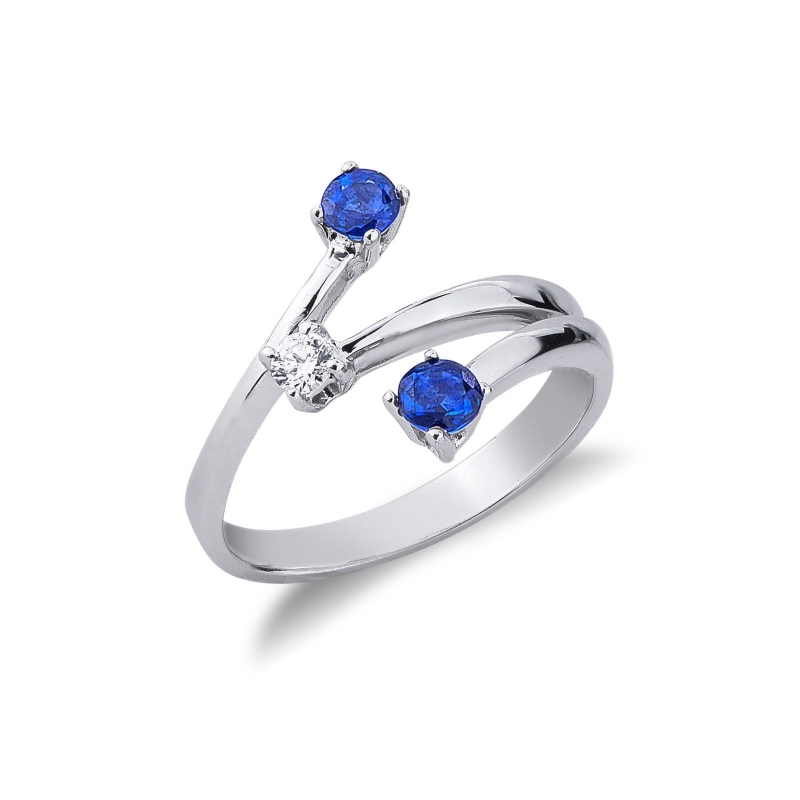 Weißgold Ring mit zwei blauen Saphiren und einem Diamant