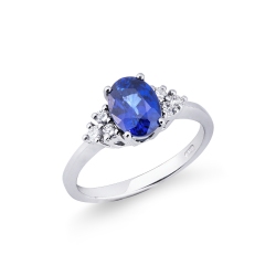 Weißgold Ring mit blauem Saphir und sechs Diamanten