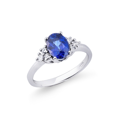Weißgold Ring mit blauem Saphir und sechs Diamanten