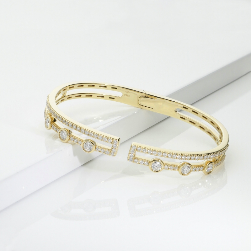 Gelbgold 750 halbstarres Armband mit Diamanten